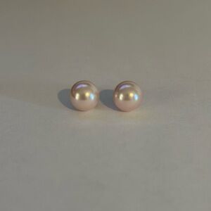 Large pink pearl stud earrings